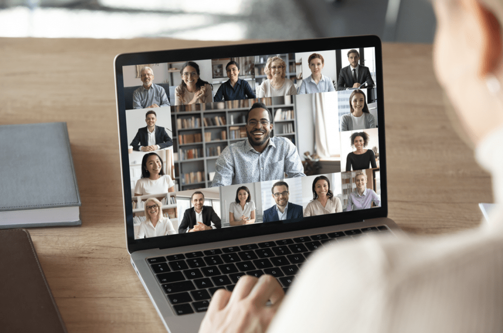Benefits of Hybrid Working | Person attending an online meeting on laptop.