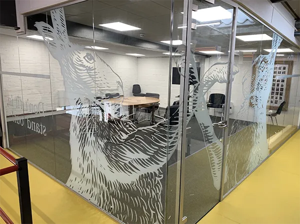 Benefits of Hybrid Working | Glazed partitioning with rabbit design.