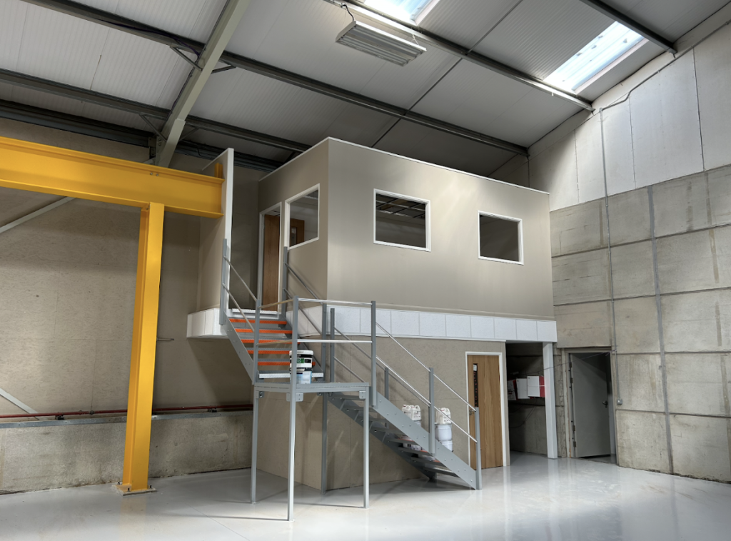 Mezzanine Floor Office | A mezzanine office, including a steel staircase.