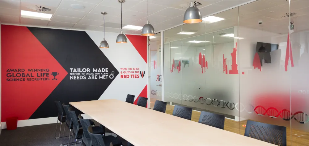 Barrington James | Modern office space with glazed partitioning.