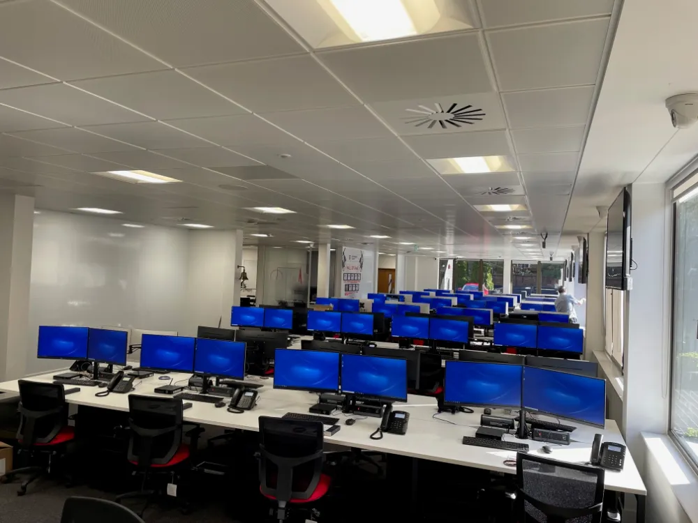 Barrington James - office area with desks and screens