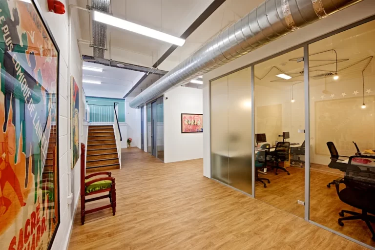 Freedom Works - Modern hallway with glass partitions