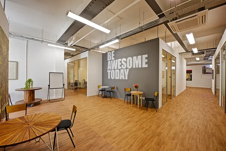 Freedom Works - Office space with "be awesome today" on the walls.