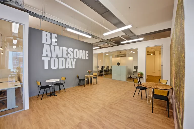 Freedom Works - Office space with "be awesome today" on the walls.