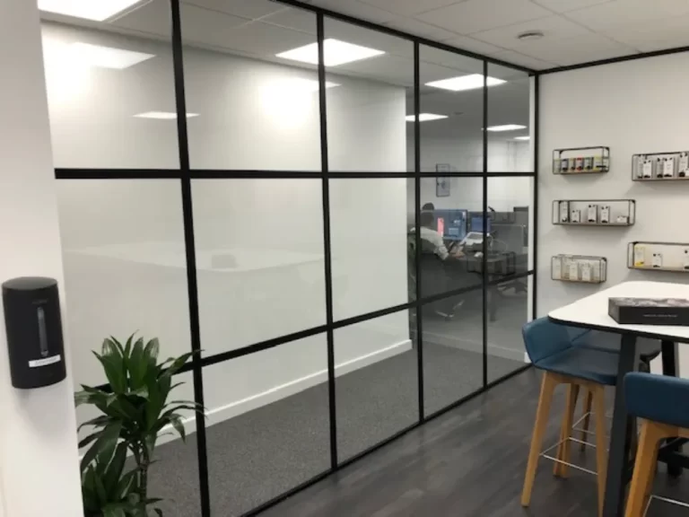 Dermapure | Glazed partitioning in an office space.
