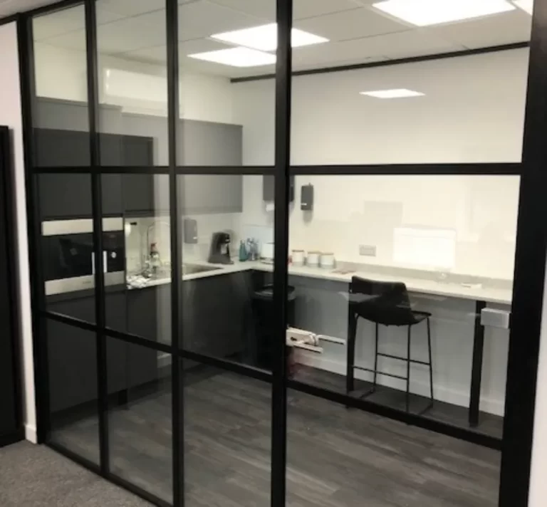 Dermapure | Glazed partitioning in an office space.