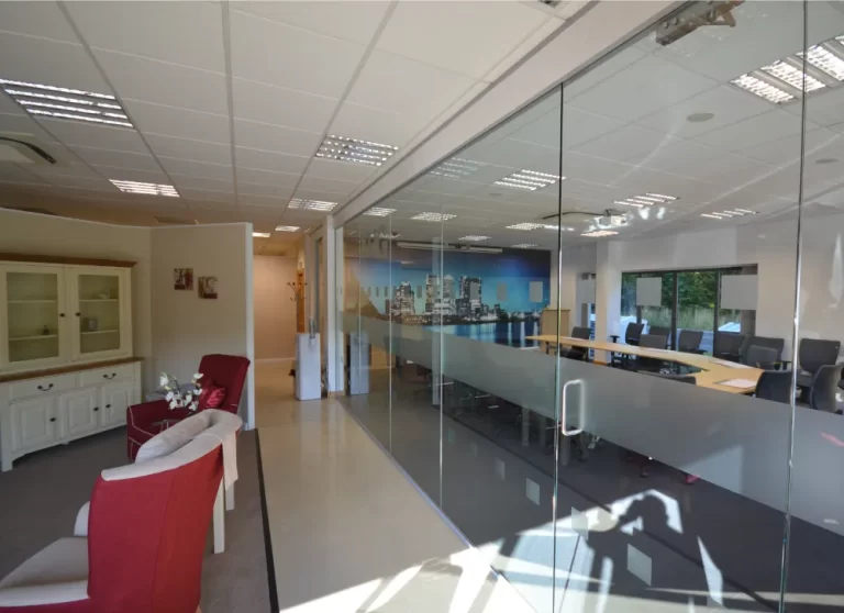 Nursing Hygiene | Modern office space with glass partitions.