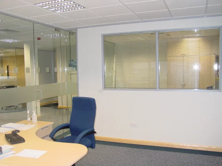 Nursing Hygiene | Modern office space with glass partitions.