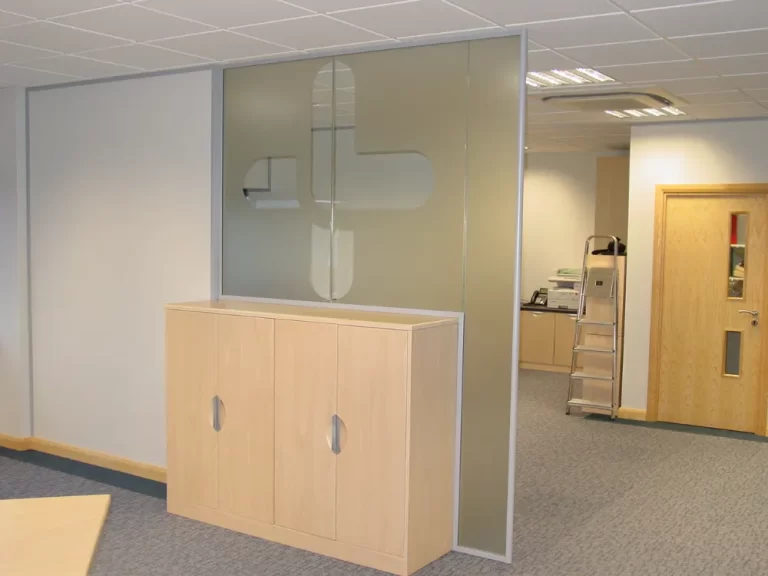 Nursing Hygiene | Modern office space with glass partitions.