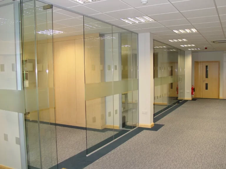 Nursing Hygiene | Modern office space with glass partitions.