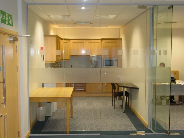 Nursing Hygiene | Modern office space with glass partitions.