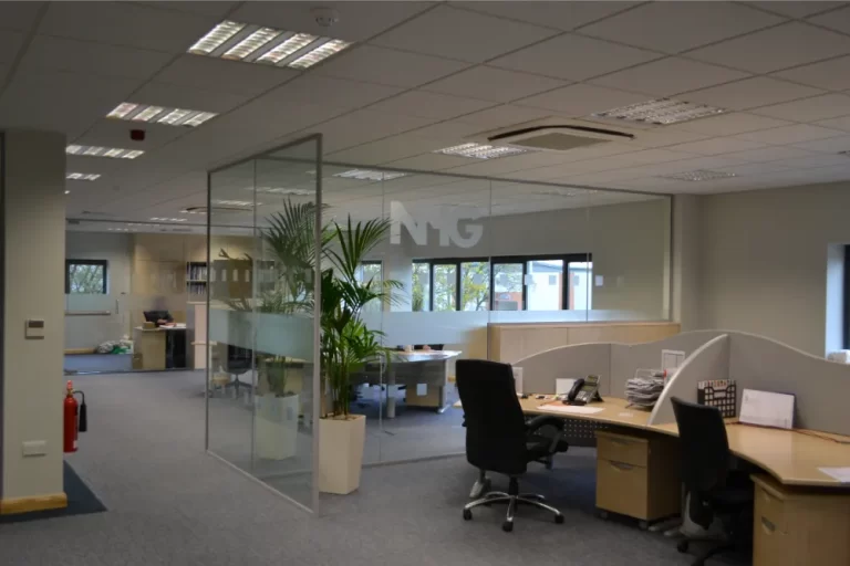 Nursing Hygiene | Modern office space with glass partitions.