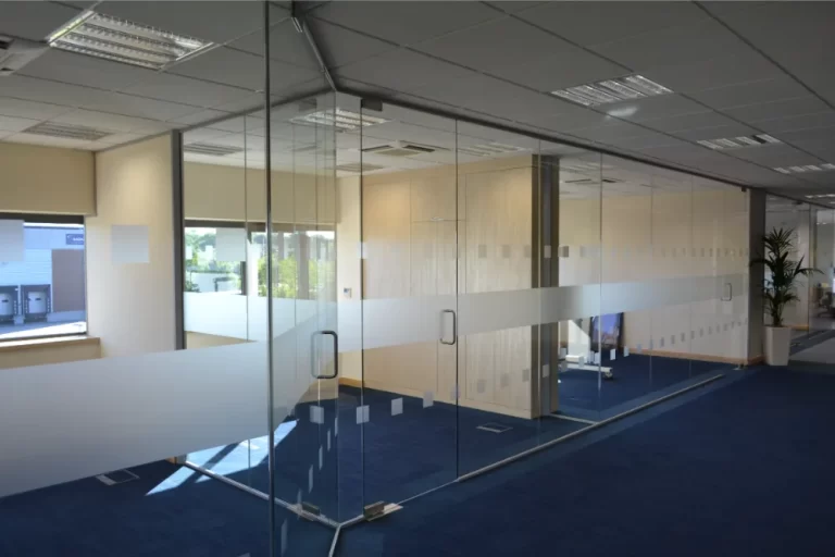 Nursing Hygiene | Modern office space with glass partitions.