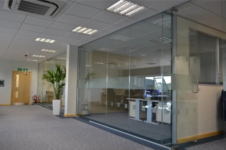 Nursing Hygiene | Modern office space with glass partitions.