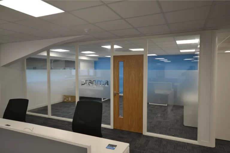 Pragma | Office with glass partitions.